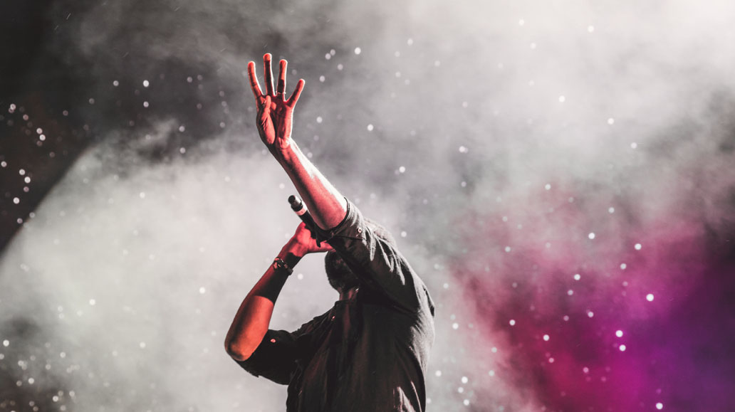 singer singing in a concert